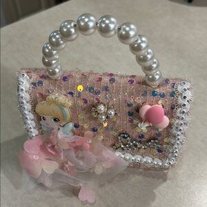 Pink sparkling Beaded Handbag with Pearl handle.